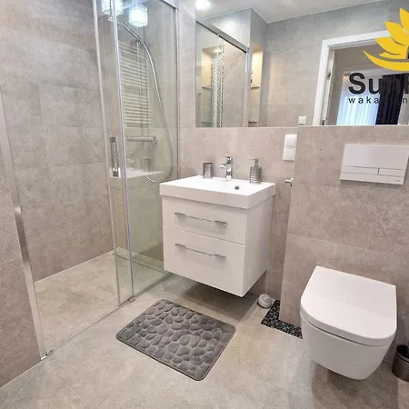 Апартаменты Sunflowers Apartament Leo Grey W Kolobrzegu *